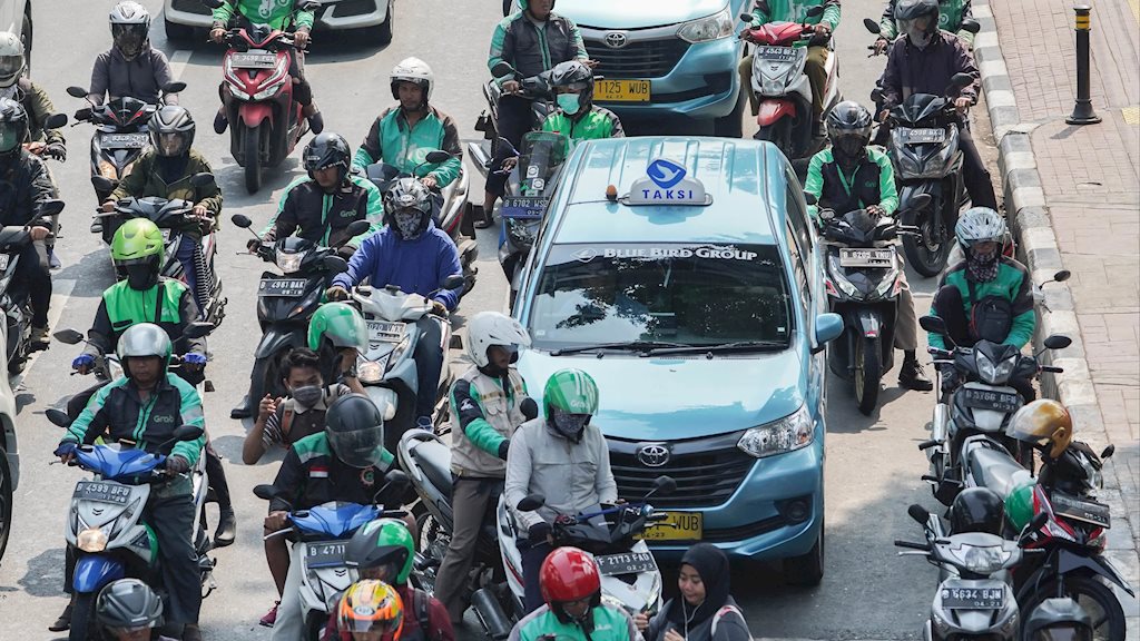 Grab, Go-Jek lo sợ hiệu ứng domino từ luật Uber tại Mỹ